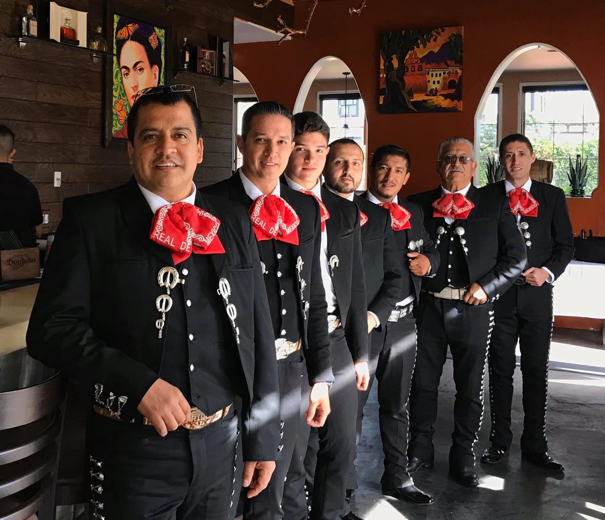 Mariachi Real De Oxnard group portrait in black suits